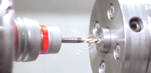 cnc milling operation close up on techniks microfloat synch tapping tool